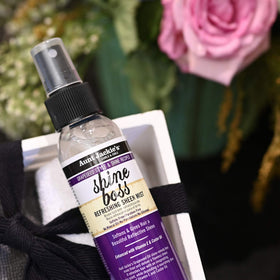 Aunt Jackie's label detail with ingredients list, showing grapeseed oil and vitamin E benefits