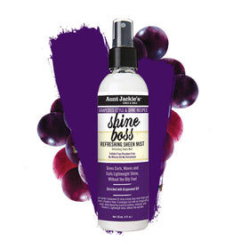 Aunt Jackie's mist spraying on curly hair to refresh shine and tame flyaways