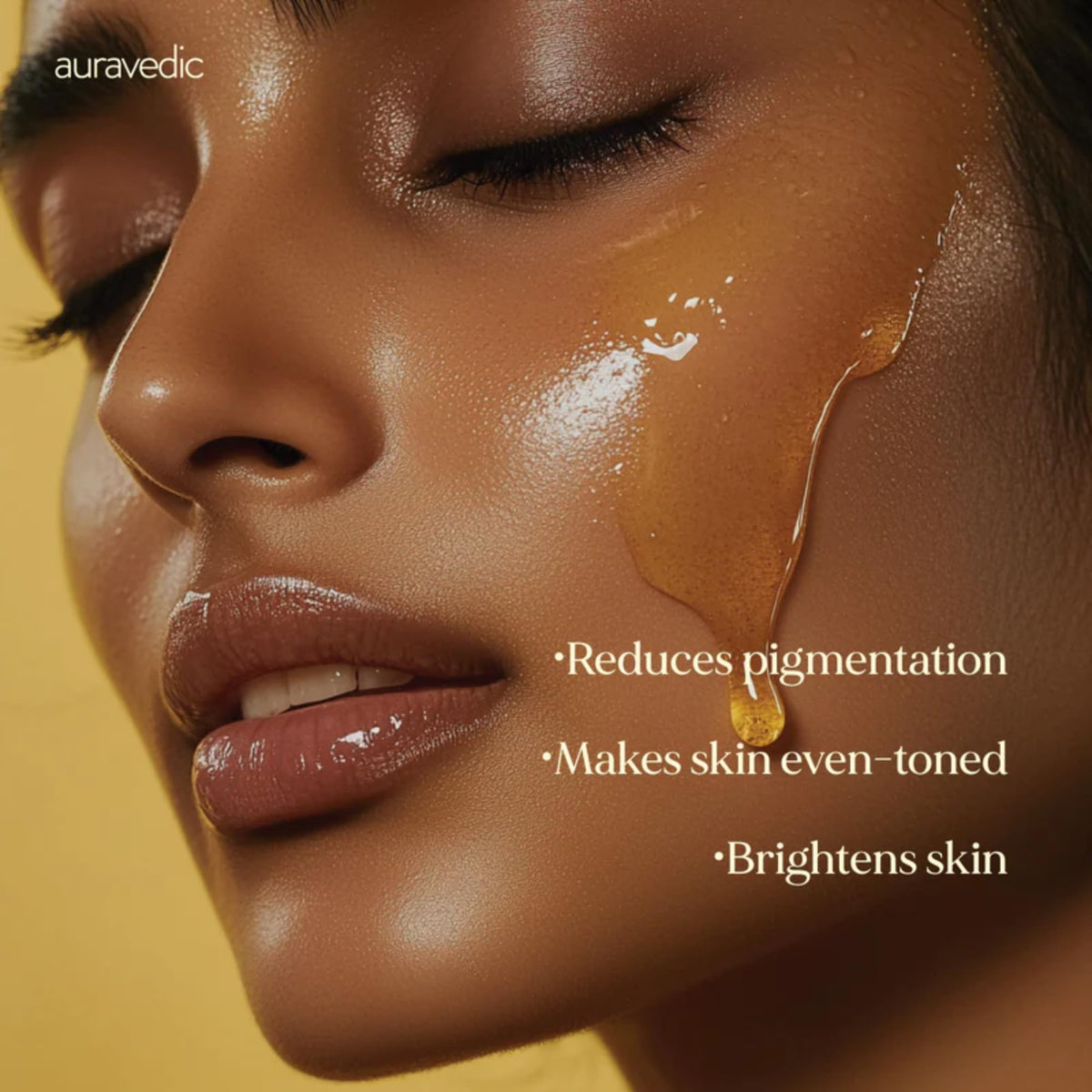 Auravedic close-up of turmeric and saffron-infused oil highlighting botanical glow