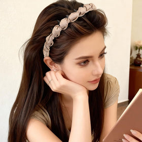 Auseibeely model wearing high cranium headband showing added crown volume