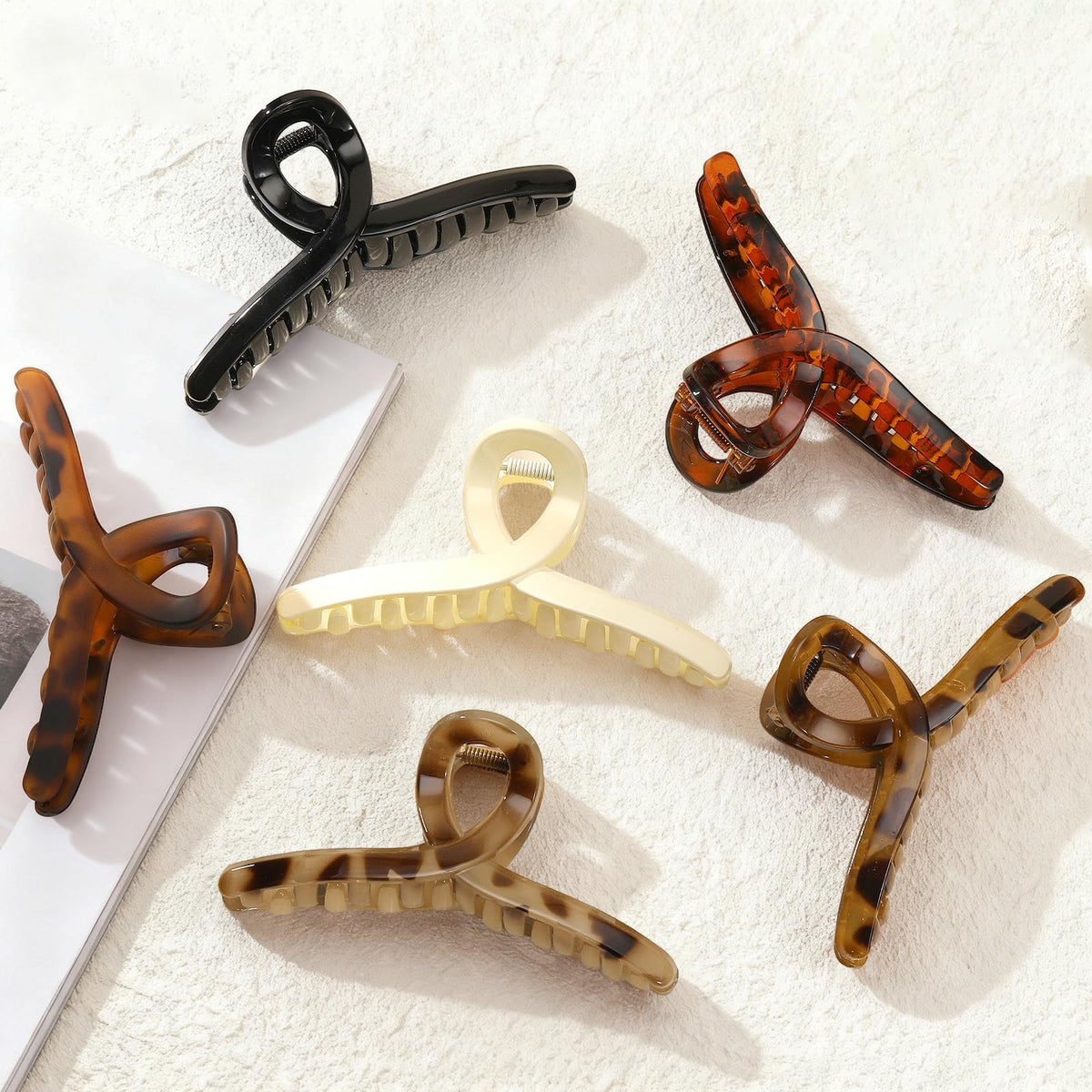 Auseibeely clips securing hair under a hat for outdoor comfort