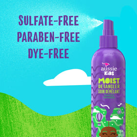 Aussie kids detangler spray action misting hair for easier combing and slip