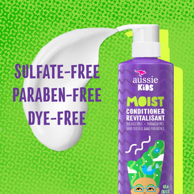 Aussie conditioner texture poured on hand, demonstrating creamy moisturizing feel
