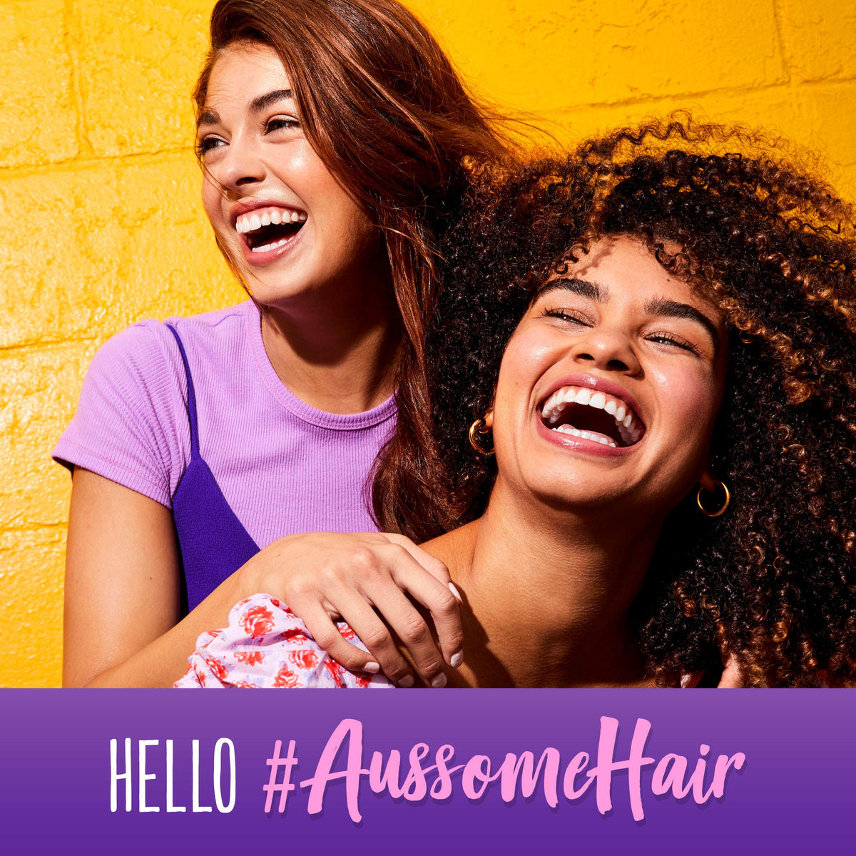 Aussie Miracle Moist shampoo being applied in shower for hydrated hair and refreshed scent
