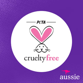Aussie Miracle Repairer rinsed hair showing sleek, moisturized finish