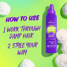 Blow-drying hair with Aussie mousse to create long-lasting volume