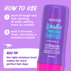 Aussie shampoo foam texture on hand illustrating gentle cleansing and softness