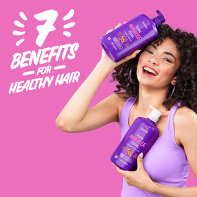 Aussie shampoo being applied in shower demonstrating gentle cleansing benefit