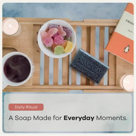 Australian Botanical soap on shower shelf in use showing unisex, invigorating routine benefit