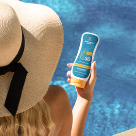 Australian Gold applied on forearm demonstrating cooling effect while active