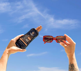 Australian Gold applied on model at the beach demonstrating hydration and instant bronzer