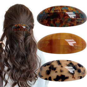 Auswalar front view of three tortoiseshell barrettes showing classic style and hold