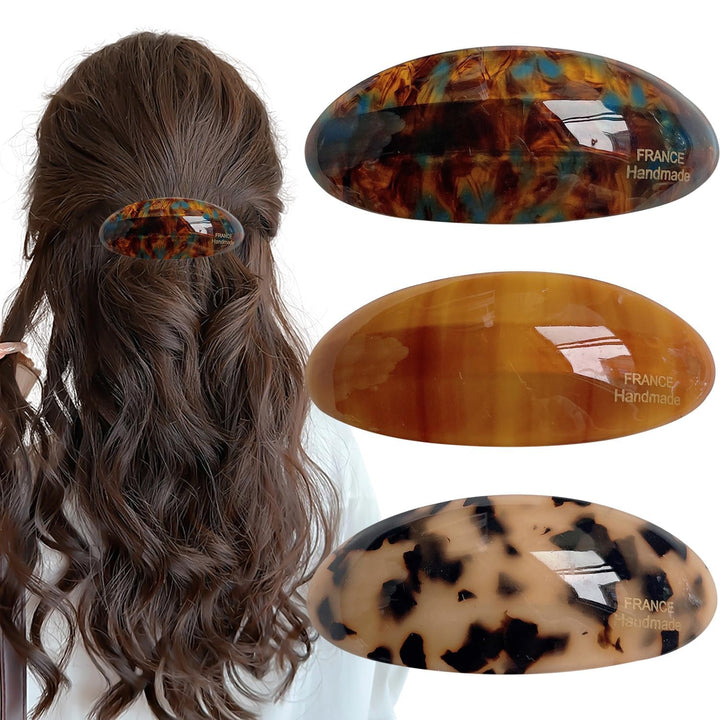 Auswalar front view of three tortoiseshell barrettes showing classic style and hold