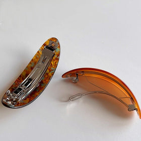 Auswalar metal spring detail showing durable clip and secure grip