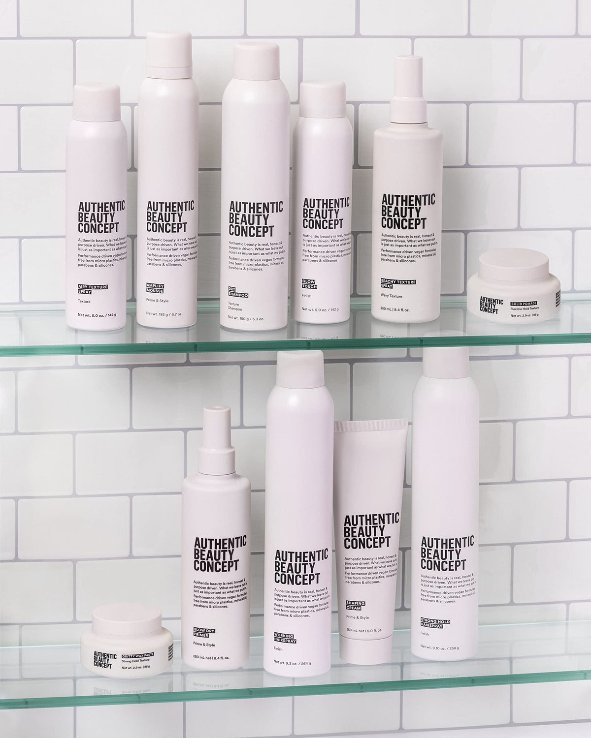 Authentic Beauty Concept mousse being blow-dried to create root lift and body