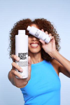 Authentic Beauty Concept after photo of defined curls for improved bounce and shine