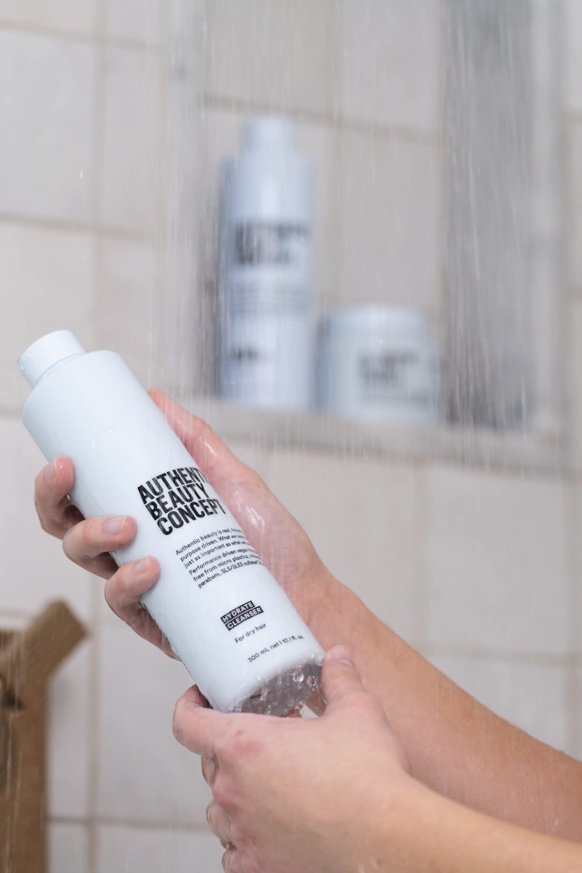 Authentic Beauty Concept shampoo lathering on wet hair to show effective cleansing
