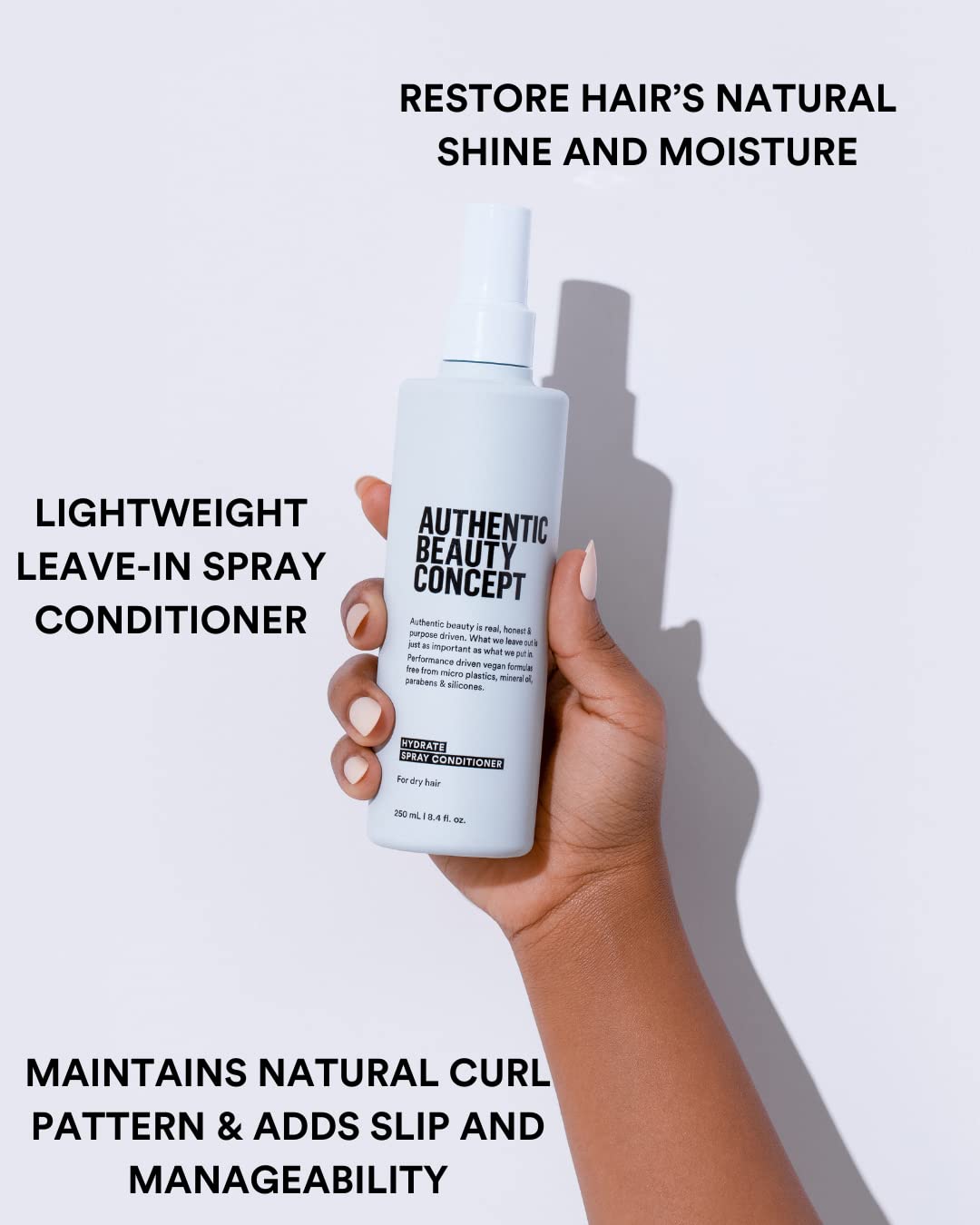 Authentic Beauty Concept nozzle close-up demonstrating fine mist for even distribution