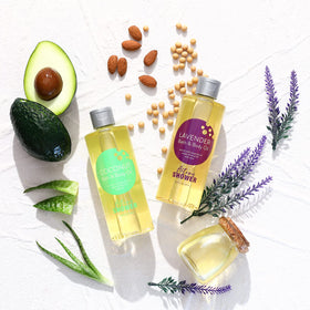 Autumn Shower bottle beside bathtub conveying relaxing bath use and ambiance benefit
