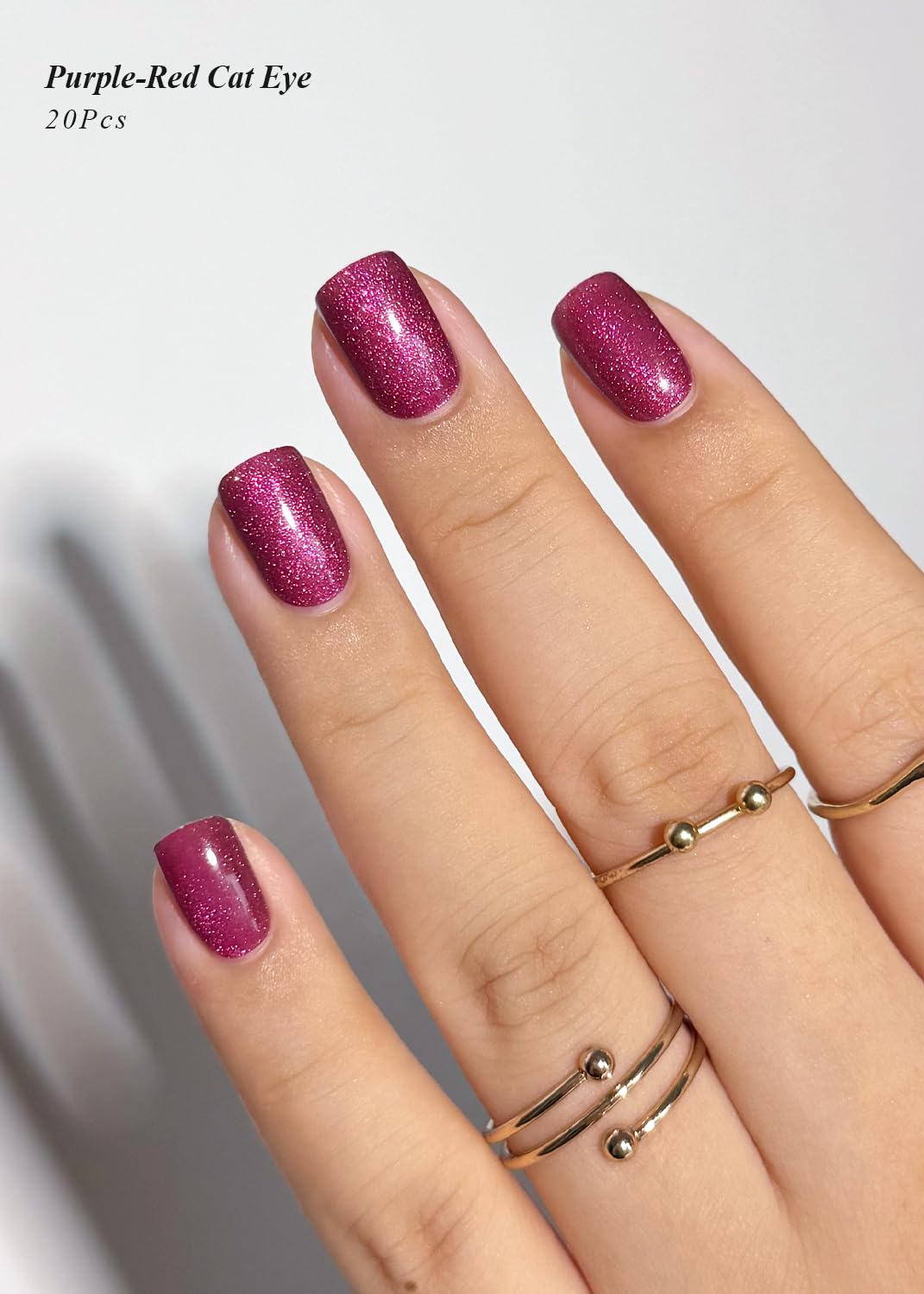 AutyaMee cured nails under LED lamp demonstrating glossy finish and lasting wear