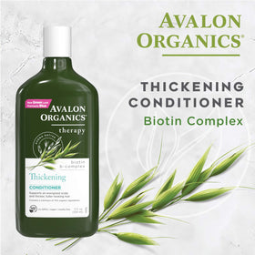 Avalon Organics creamy conditioner texture on palm showing smooth, lightweight conditioning benefit