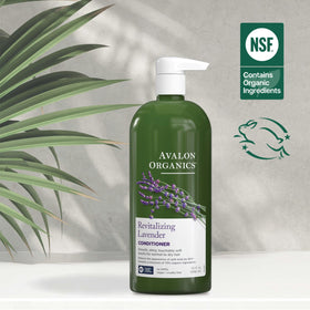 Avalon Organics conditioner surrounded by quinoa and aloe to highlight botanical strengthening benefits
