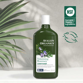 Avalon Organics bottle on bathroom shelf suggesting daily use for fuller, healthier-looking hair