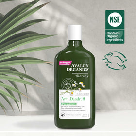 Avalon Organics 11 fl oz bottle held in hand showing consumer size and scale