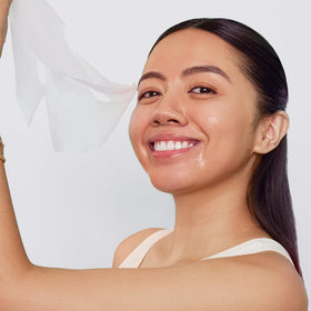 Avatara model wearing sheet mask demonstrating soothing, calming result