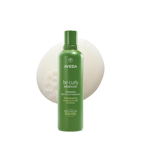 Aveda Be Curly front bottle showing packaging and calming citrus scent benefit