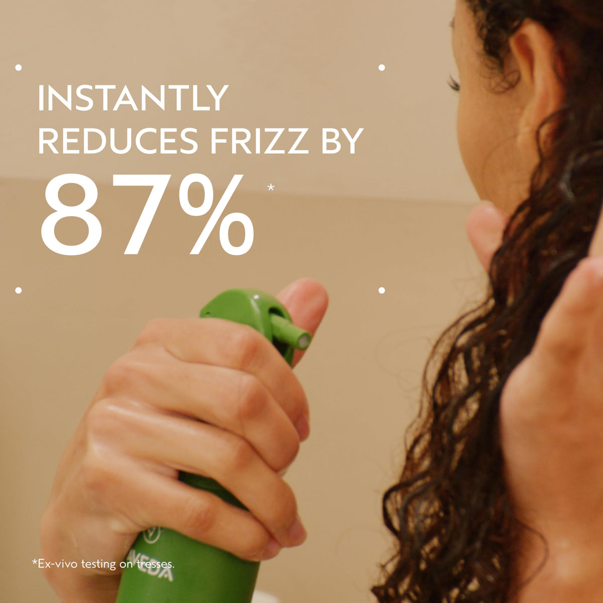 Aveda Be Curly spray nozzle detail highlighting controlled mist for even application