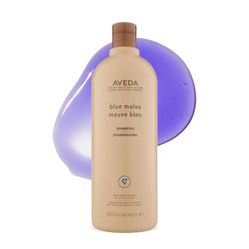 Aveda Blue Malva front bottle view showing sleek salon packaging and clarity