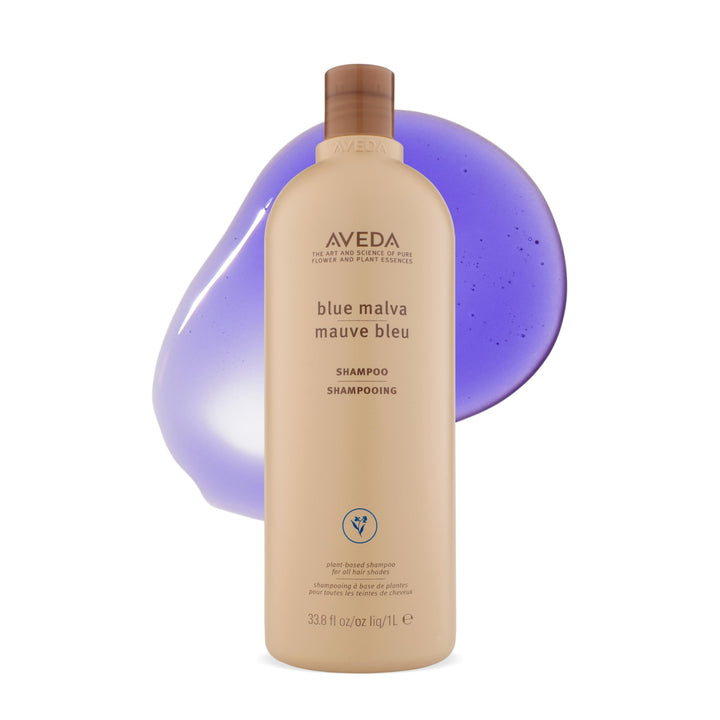 Aveda Blue Malva front bottle view showing sleek salon packaging and clarity