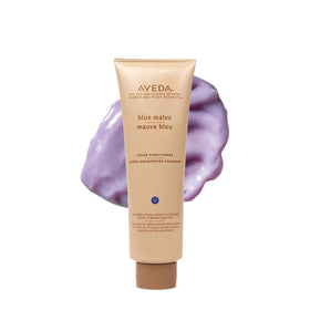 Aveda Blue Malva front packaging showing bottle and label benefit brightens tones