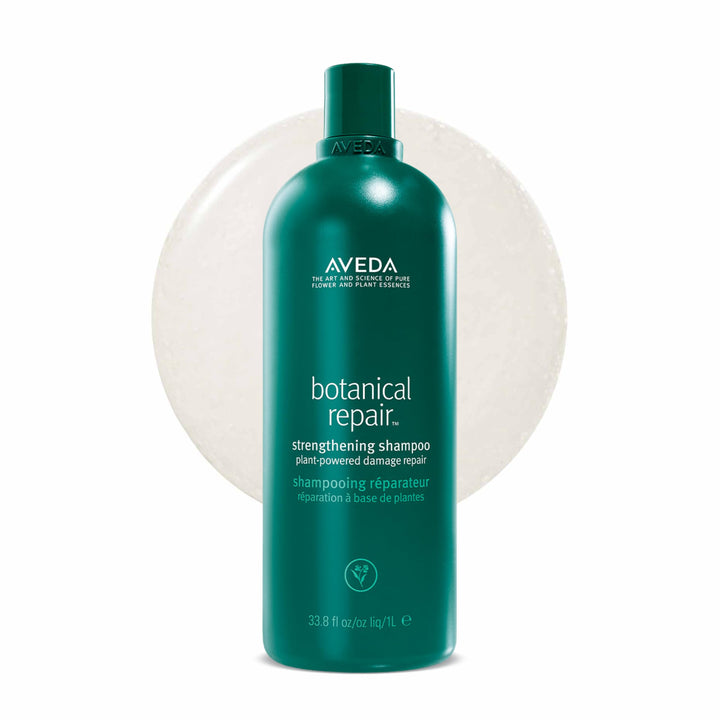 Aveda bottle front view showing brand and repair shampoo benefits