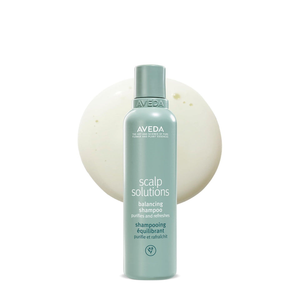 Aveda bottle front label showing product name and size for clear identification and confidence
