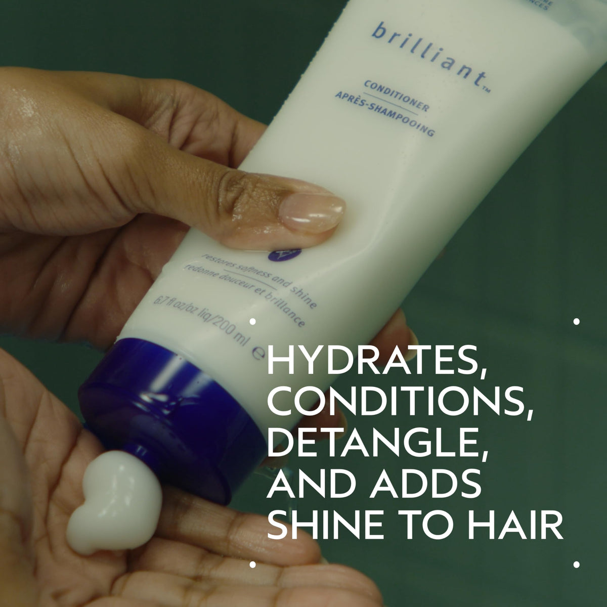 Aveda Brilliant conditioner being dispensed to show easy application benefit