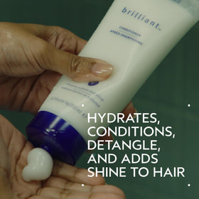 Aveda Brilliant conditioner being dispensed to show easy application benefit