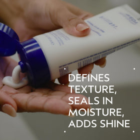 Aveda cream texture close-up illustrating smooth consistency and easy spreadability