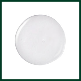 Aveda Brilliant ingredients label with botanical highlights for natural-origin reassurance