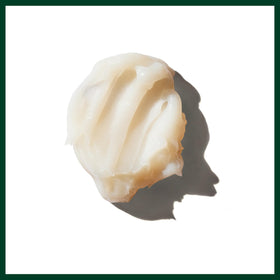 Aveda Brilliant label close-up listing scent and free-from formulation benefits