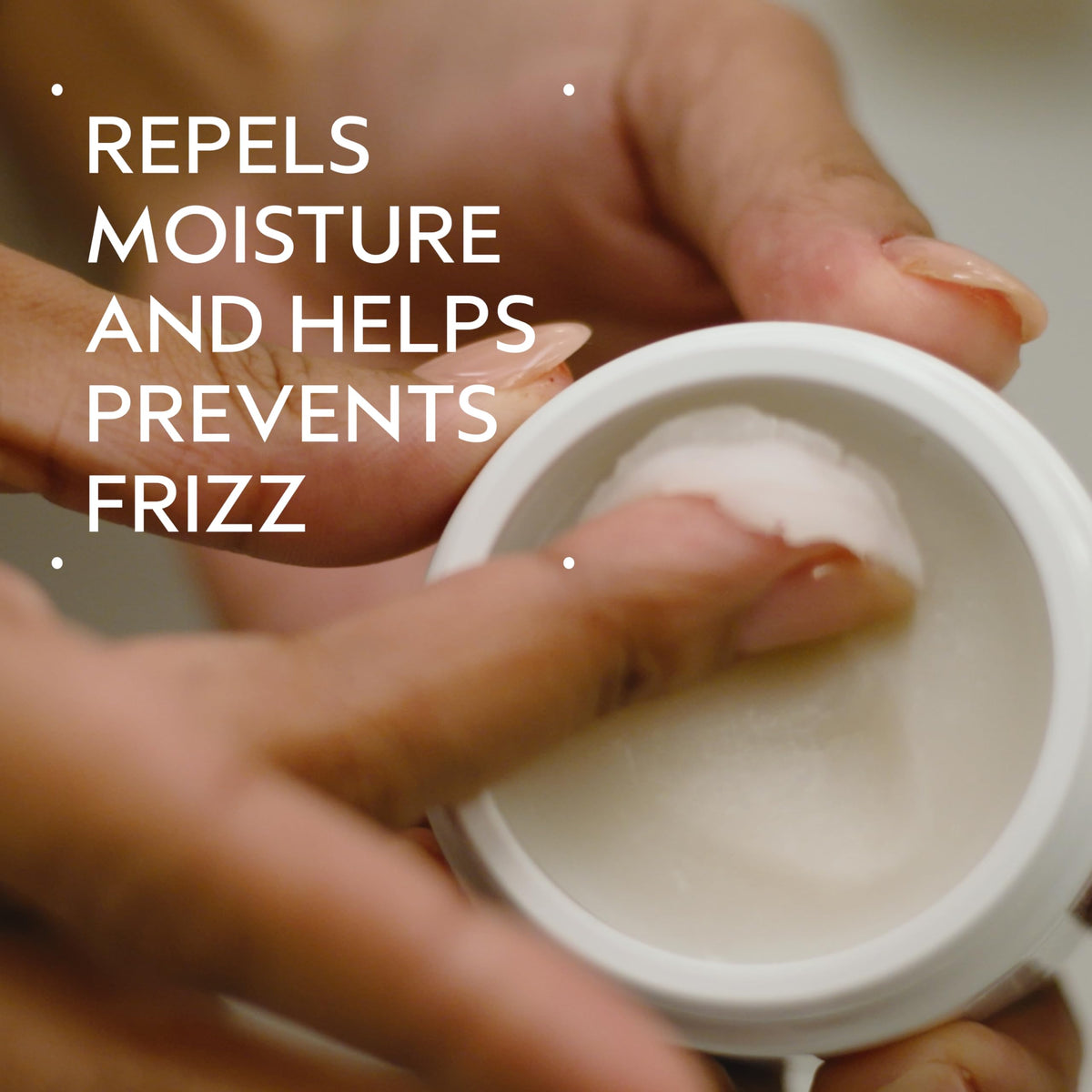Aveda Brilliant open jar showing smooth satin texture and easy application