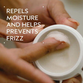 Aveda Brilliant open jar showing smooth satin texture and easy application