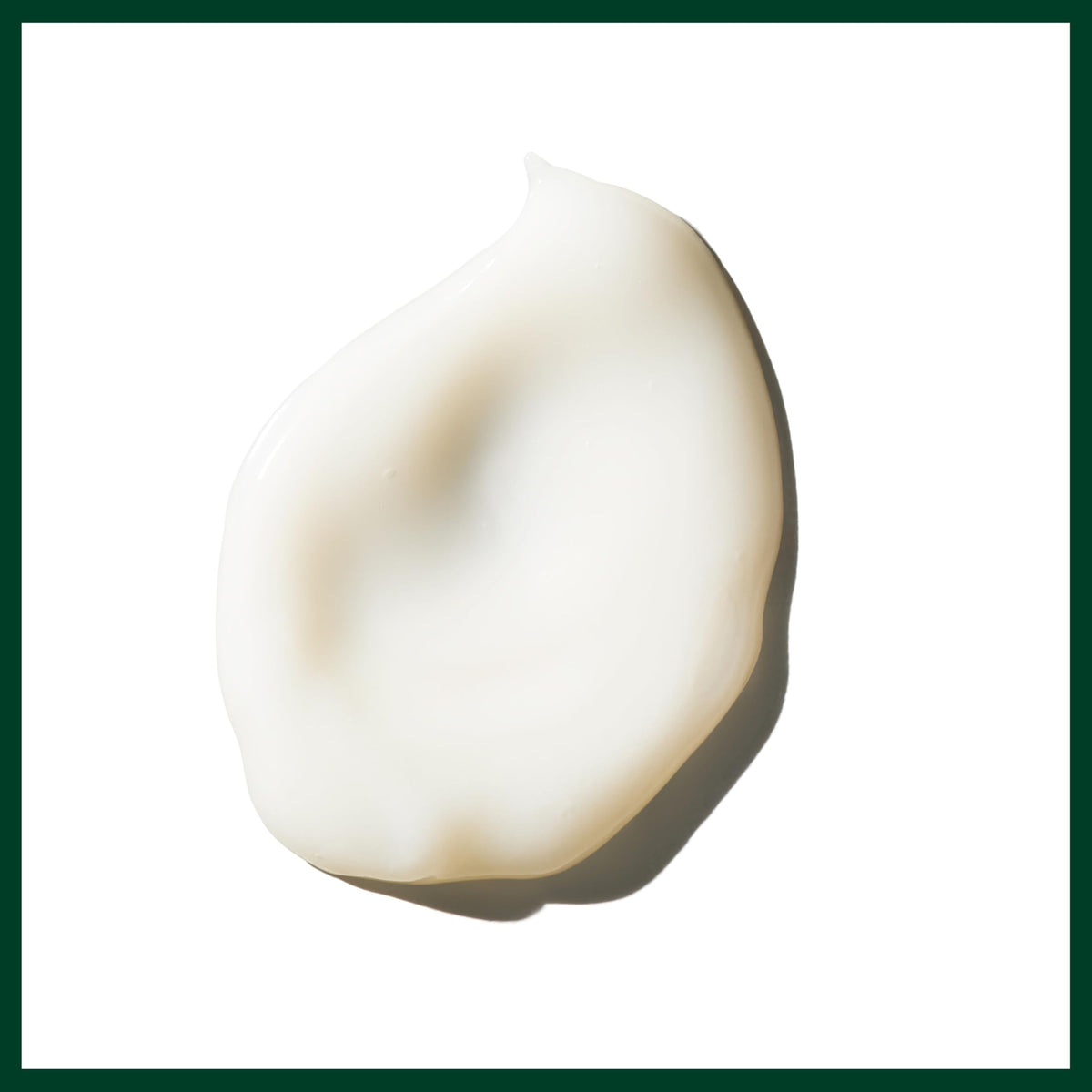 Applying Aveda Cherry Almond to damp hair demonstrating detangling and smoothing benefit