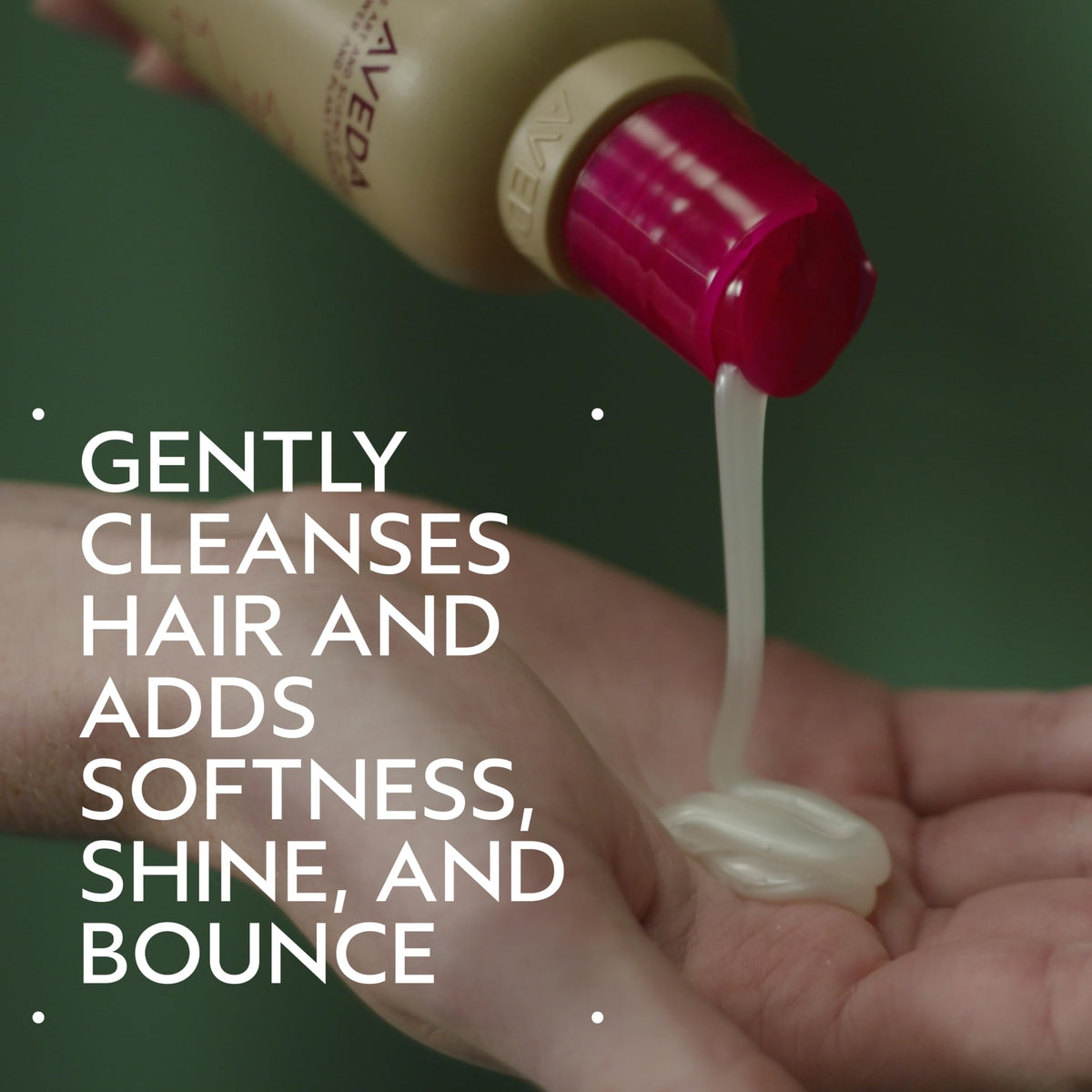Aveda label close-up emphasizing cherry almond scent and claims
