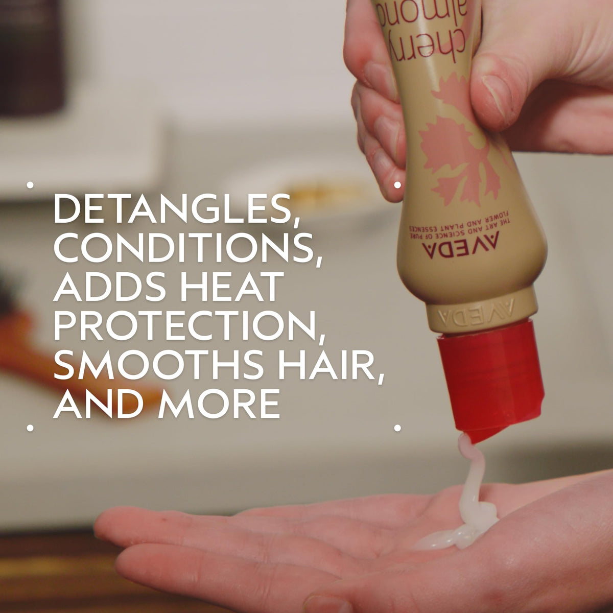 Aveda Cherry Almond cream texture close-up illustrating lightweight, non-greasy absorption