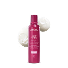 Aveda product front view showing rich shampoo and brand, conveys clean color protection