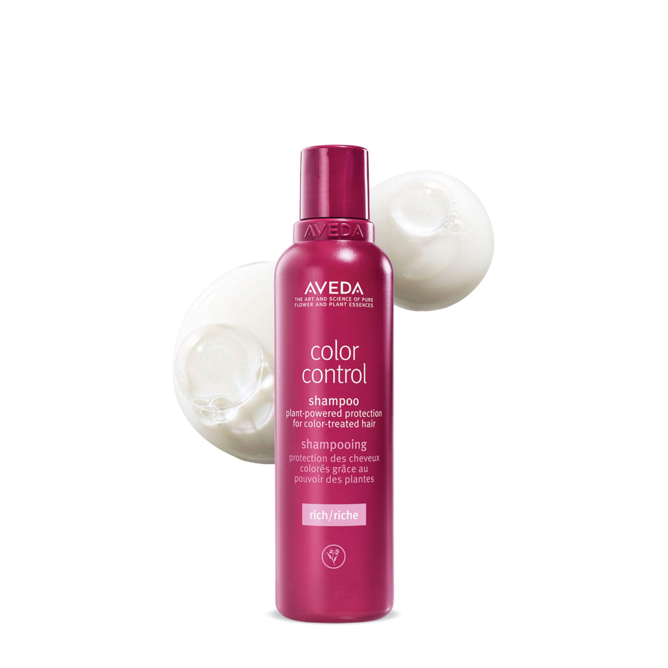 Aveda product front view showing rich shampoo and brand, conveys clean color protection