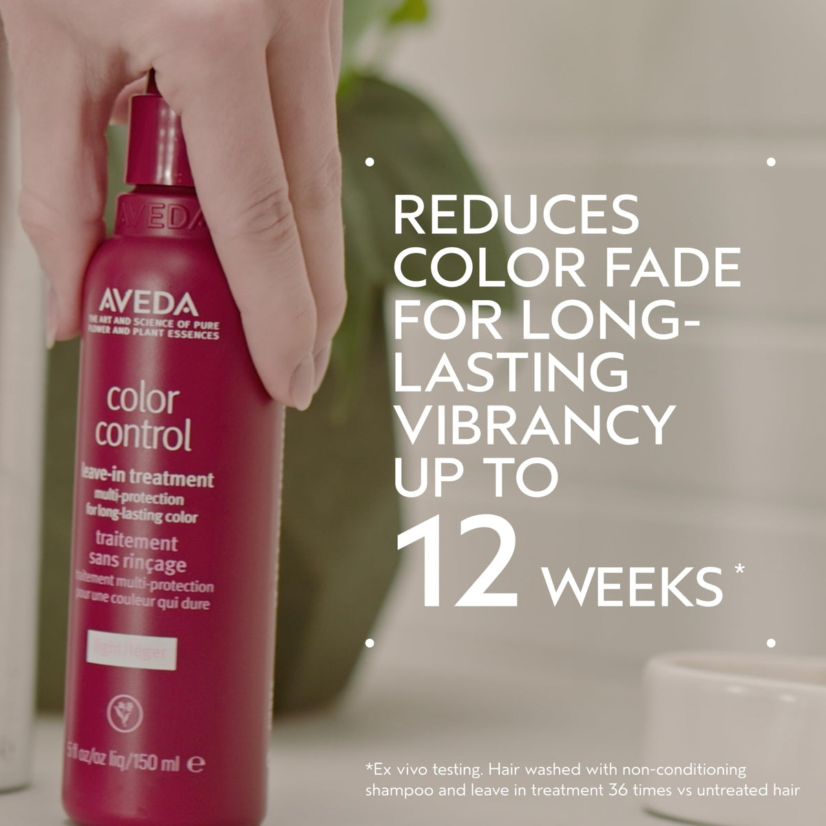 Aveda spray nozzle close-up delivering even mist for easy application