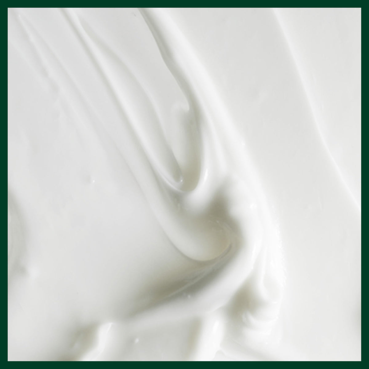 Aveda conditioner on a shower ledge indicating easy daily use